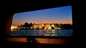 Iris-Diana_night_porthole_view_marina_Corfu-9x16