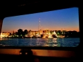 Iris-Diana_night_porthole_view_marina_Corfu-9x16